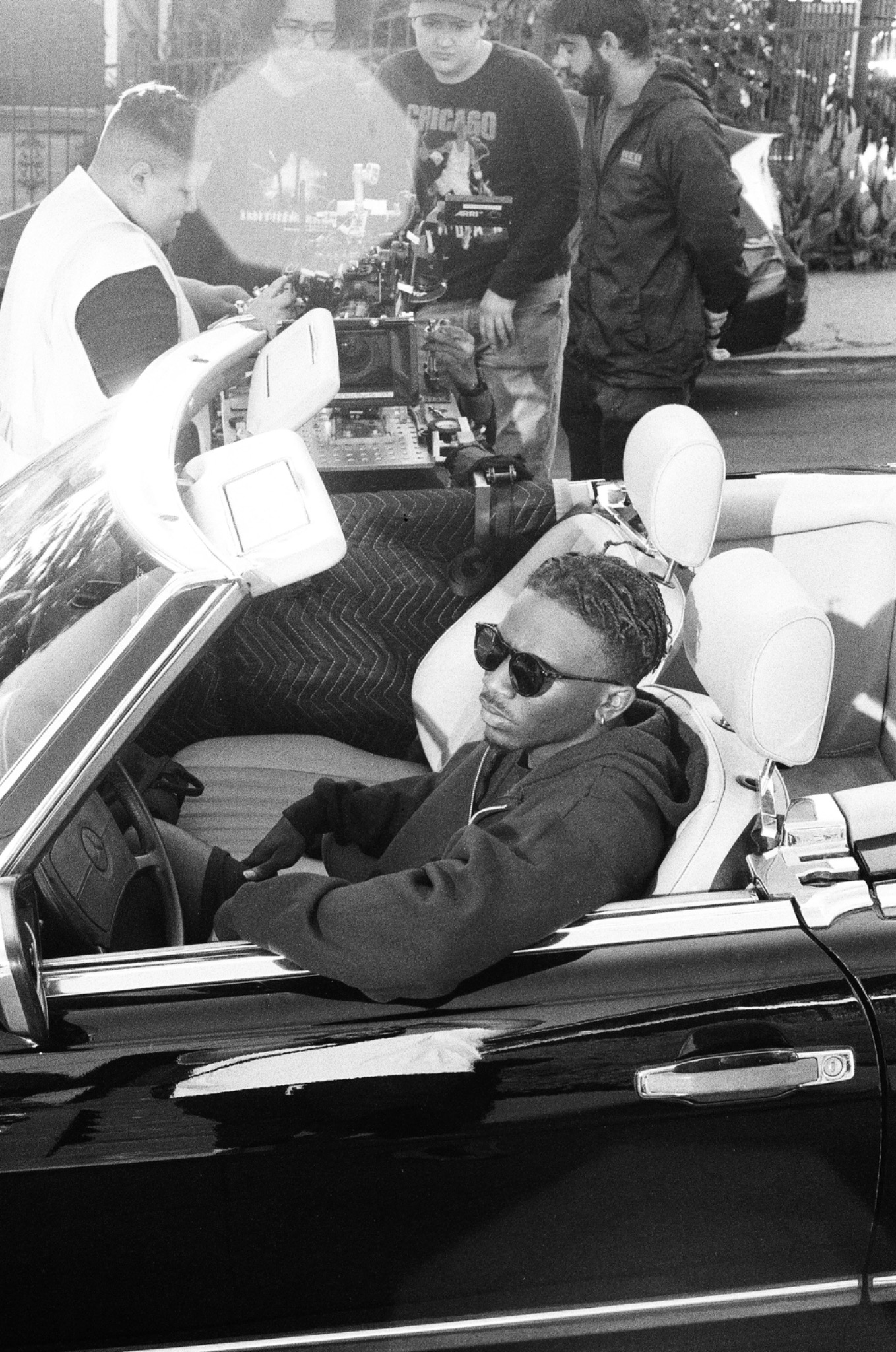 Behind the scenes of KEYZ during a convertible car setup